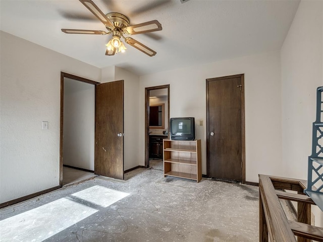 bedroom with ceiling fan and baseboards