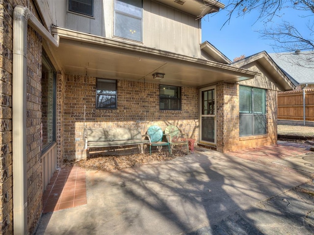 view of patio / terrace featuring fence