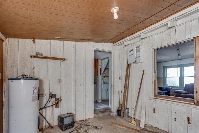 21731 E Fifth St, Hinton, OK 73047 - interior space with water heater and wooden walls