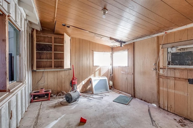 21731 E Fifth St, Hinton, OK 73047 - misc room featuring concrete floors and wood walls