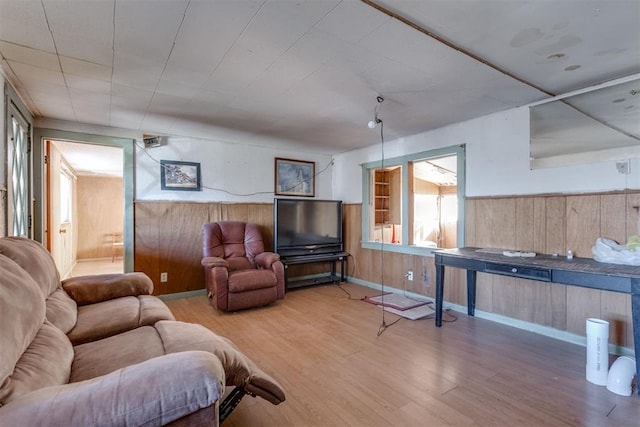 21731 E Fifth St, Hinton, OK 73047 - living room with wood walls and light wood-type flooring