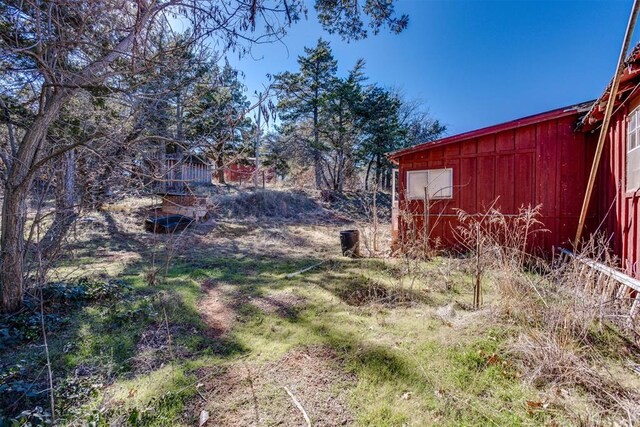 21731 E Fifth St, Hinton, OK 73047 - view of yard with an outbuilding