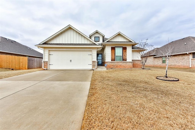 view of front of house with a garage and a front yard