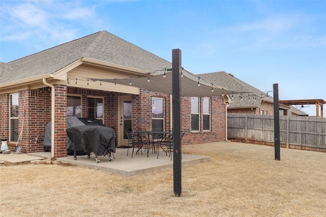 rear view of house featuring a patio