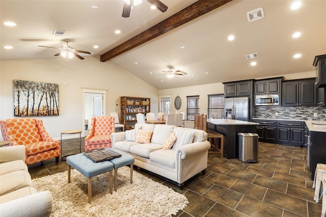 living room with vaulted ceiling with beams and ceiling fan