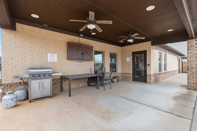 view of patio / terrace featuring ceiling fan and area for grilling