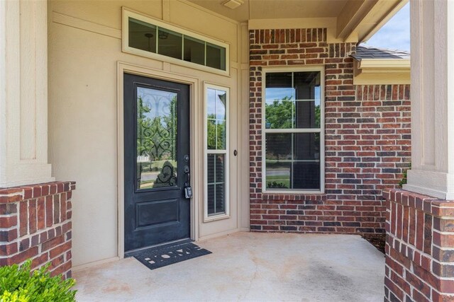 3524 Mount Mitchell Ln, Norman, OK 73069 - doorway to property with brick siding and stucco siding