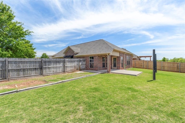 3524 Mount Mitchell Ln, Norman, OK 73069 - rear view of property featuring brick siding, a patio, and a shingled roof