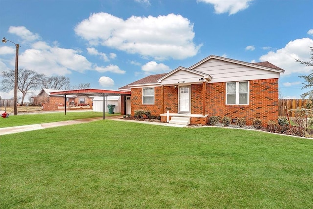 ranch-style home with a carport and a front lawn