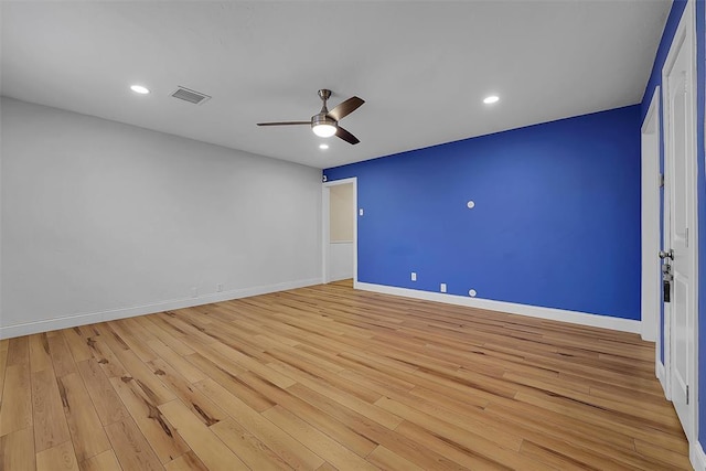 spare room with ceiling fan and light hardwood / wood-style flooring