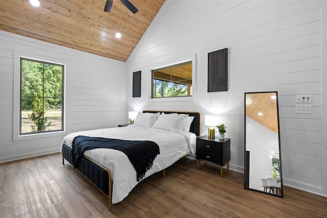 bedroom featuring wood ceiling, lofted ceiling, and hardwood / wood-style floors