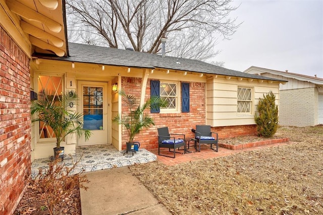 back of property featuring a patio