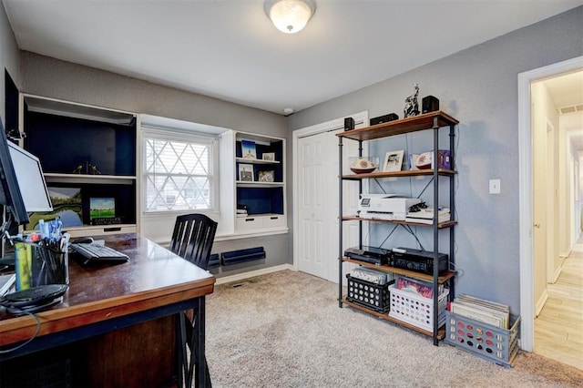 home office featuring carpet flooring