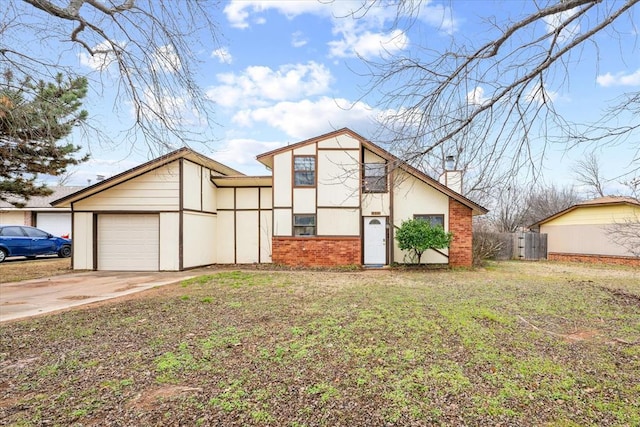 view of front of property with a garage and a front yard