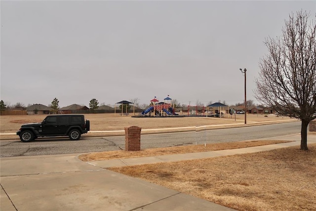 view of yard featuring playground community