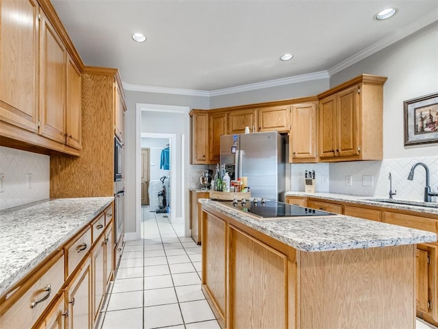 kitchen with black electric stovetop, a kitchen island, a sink, stainless steel fridge, and crown molding