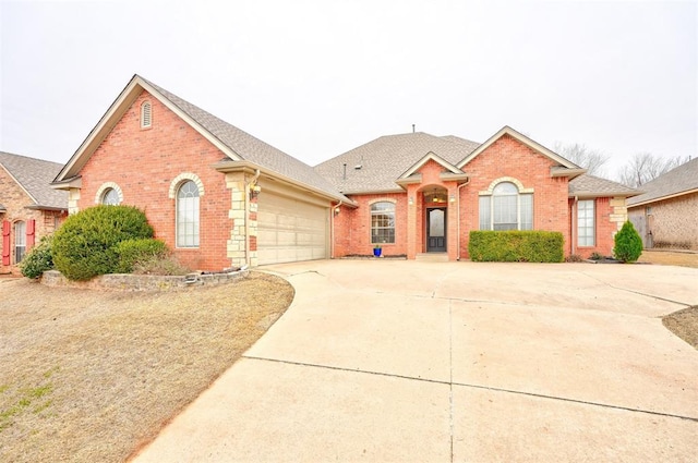 ranch-style home featuring a garage