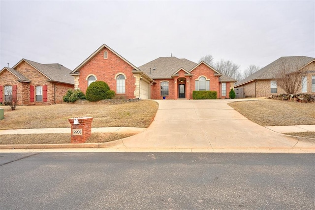 ranch-style home featuring a garage