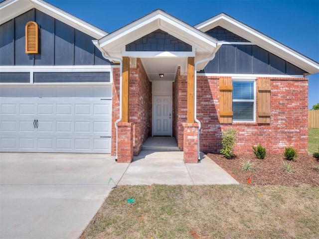 13136 Mannington Rd, Edmond, OK 73025 - single story home with brick siding, driveway, board and batten siding, and a garage