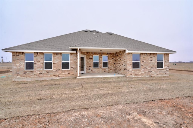 back of property with a patio area