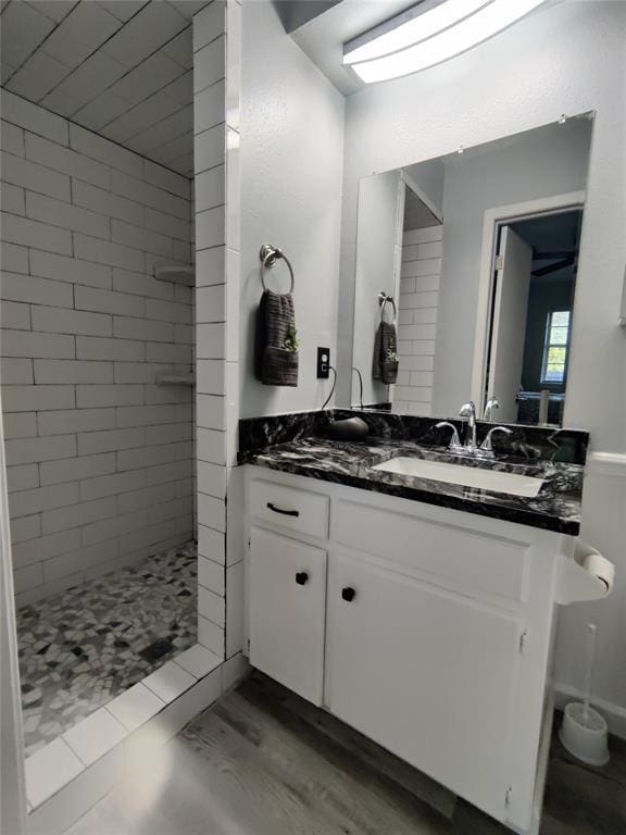 full bath featuring vanity and a stall shower