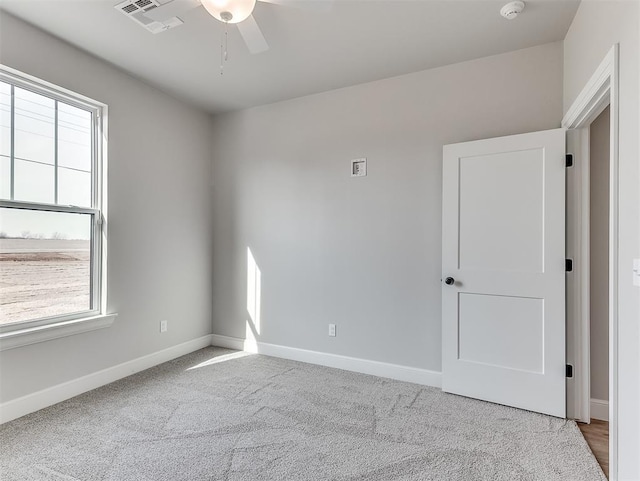 6209 Rivergate Dr, Shawnee, OK 74804 - carpeted empty room featuring ceiling fan