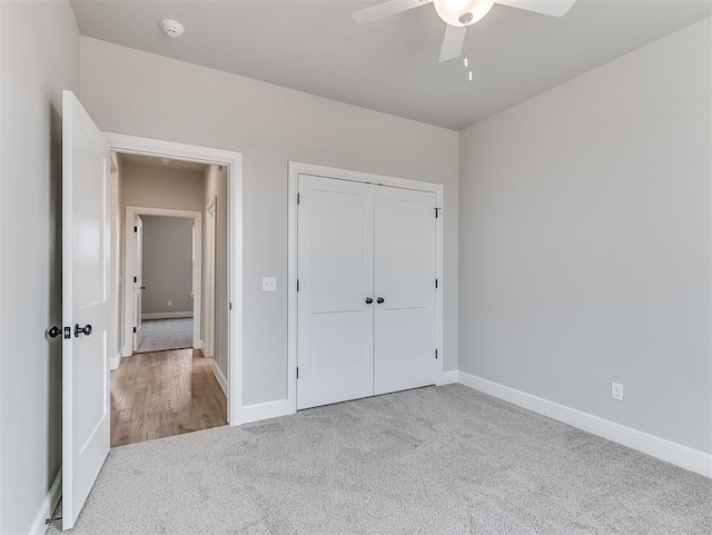 6209 Rivergate Dr, Shawnee, OK 74804 - unfurnished bedroom featuring ceiling fan, a closet, and light carpet