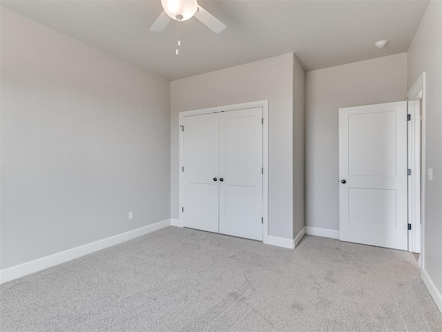 6209 Rivergate Dr, Shawnee, OK 74804 - unfurnished bedroom featuring light colored carpet, ceiling fan, and a closet