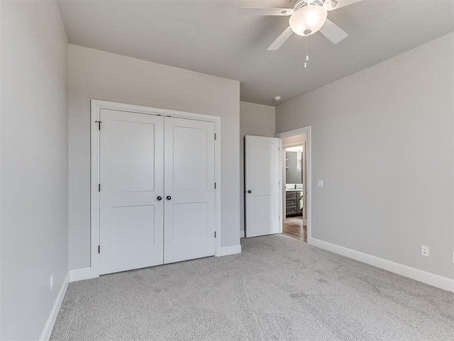 6209 Rivergate Dr, Shawnee, OK 74804 - unfurnished bedroom featuring light carpet, ceiling fan, and a closet