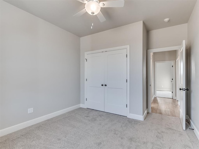 6209 Rivergate Dr, Shawnee, OK 74804 - unfurnished bedroom featuring light colored carpet, a closet, and ceiling fan