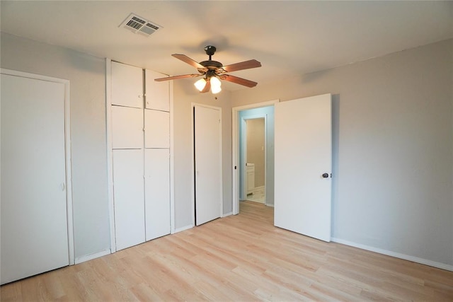 unfurnished bedroom featuring ceiling fan and light hardwood / wood-style flooring