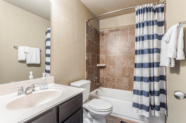 full bathroom featuring toilet, shower / bath combo with shower curtain, and vanity