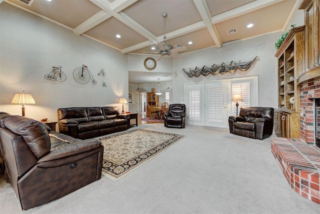 living room featuring coffered ceiling, beam ceiling, a towering ceiling, a fireplace, and carpet