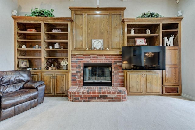 living room with light carpet and a brick fireplace