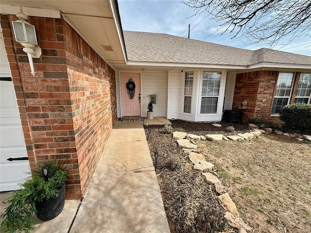 entrance to property featuring a garage