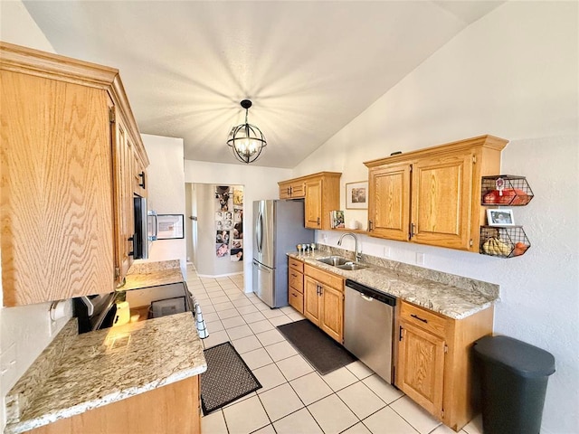 kitchen with light tile patterned flooring, lofted ceiling, sink, decorative light fixtures, and stainless steel appliances