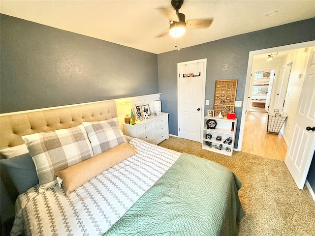 bedroom featuring carpet floors and ceiling fan