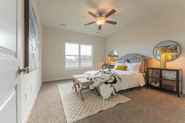 bedroom with a ceiling fan, carpet, visible vents, and baseboards