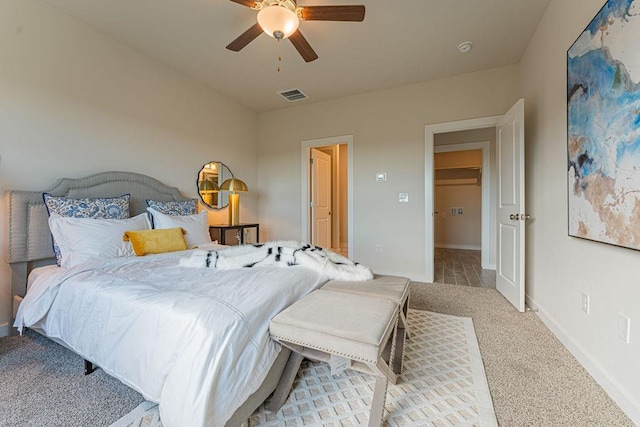 bedroom featuring baseboards, visible vents, ceiling fan, and carpet flooring