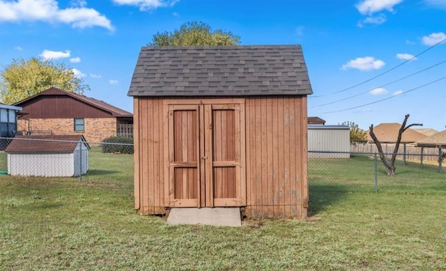 view of outdoor structure featuring a yard