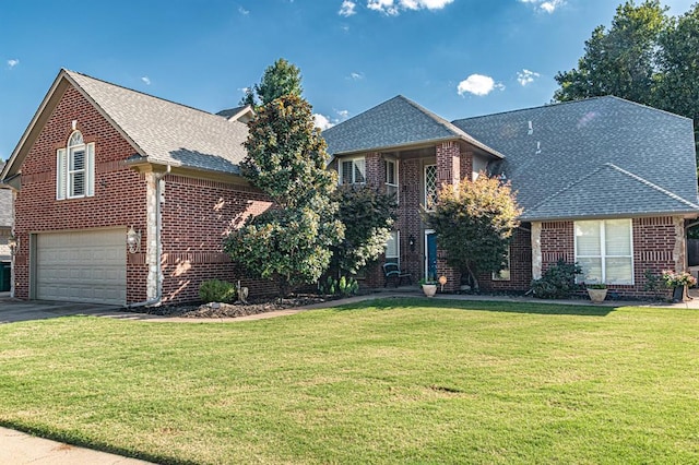 traditional home with driveway, a shingled roof, a front lawn, and brick siding