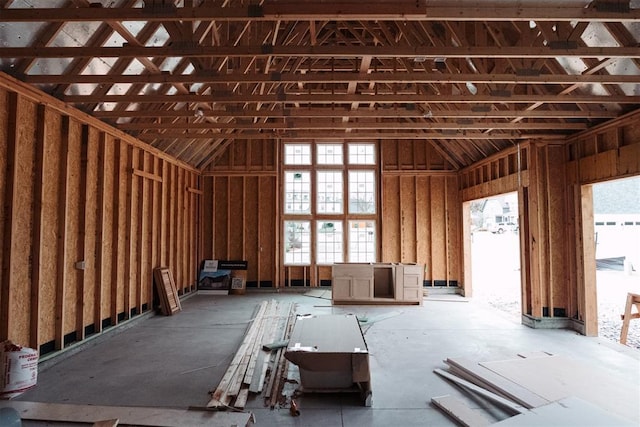 miscellaneous room with a towering ceiling