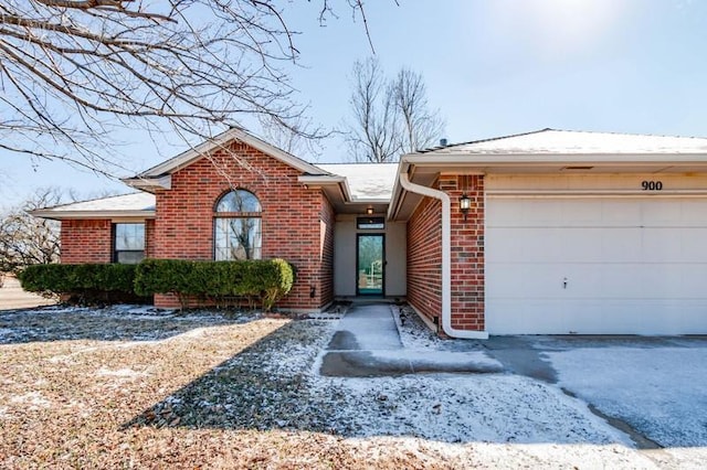 ranch-style home with a garage