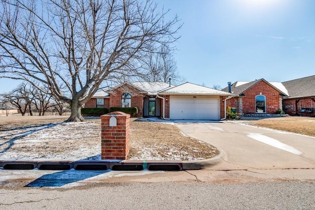 single story home featuring a garage