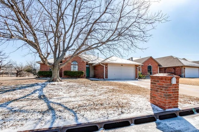 single story home with a garage