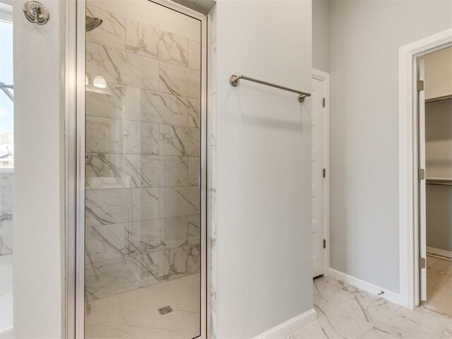 817 Carrie Ct, Purcell, OK 73080 - full bath with a spacious closet, baseboards, marble finish floor, and a marble finish shower