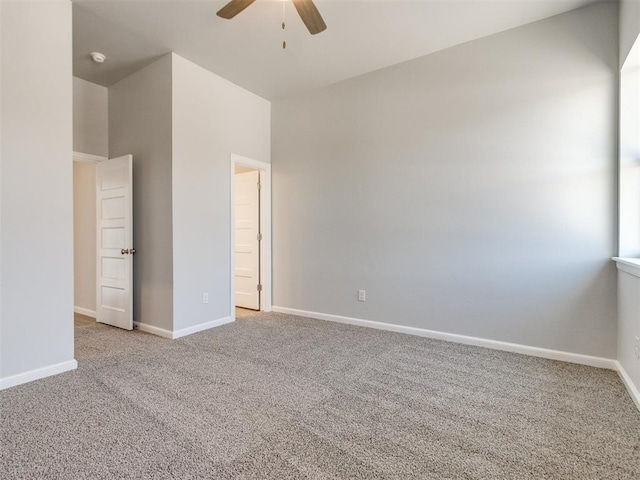 817 Carrie Ct, Purcell, OK 73080 - empty room featuring light carpet, baseboards, and ceiling fan