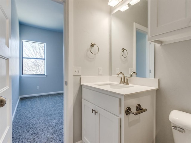 817 Carrie Ct, Purcell, OK 73080 - half bath featuring baseboards, toilet, and vanity