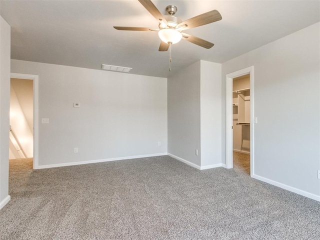 817 Carrie Ct, Purcell, OK 73080 - carpeted spare room with a ceiling fan, visible vents, and baseboards
