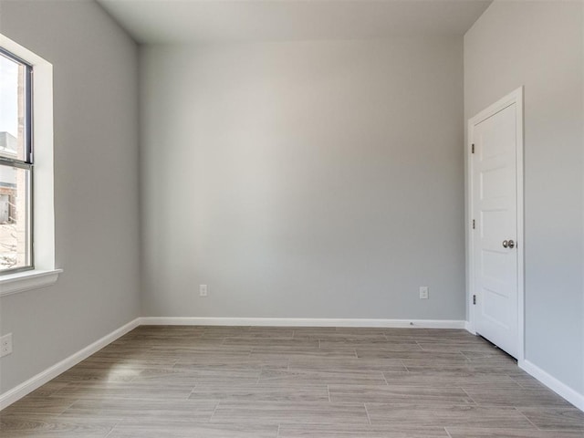 817 Carrie Ct, Purcell, OK 73080 - empty room featuring baseboards and light wood-style floors